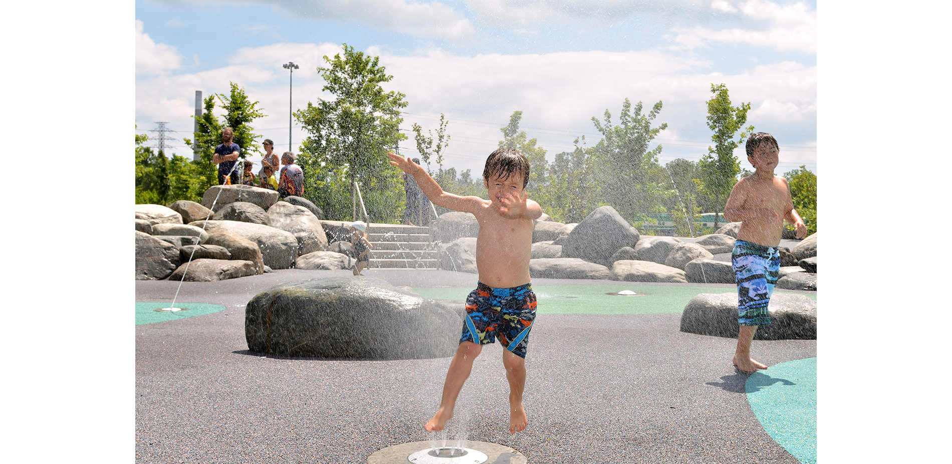 Kids Playing in Water Play Zone