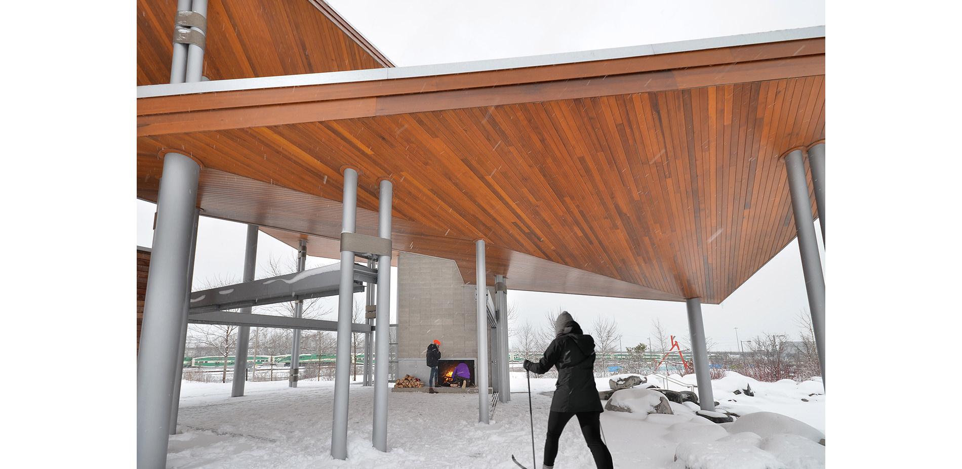 People Under Pavilion by Fireplace