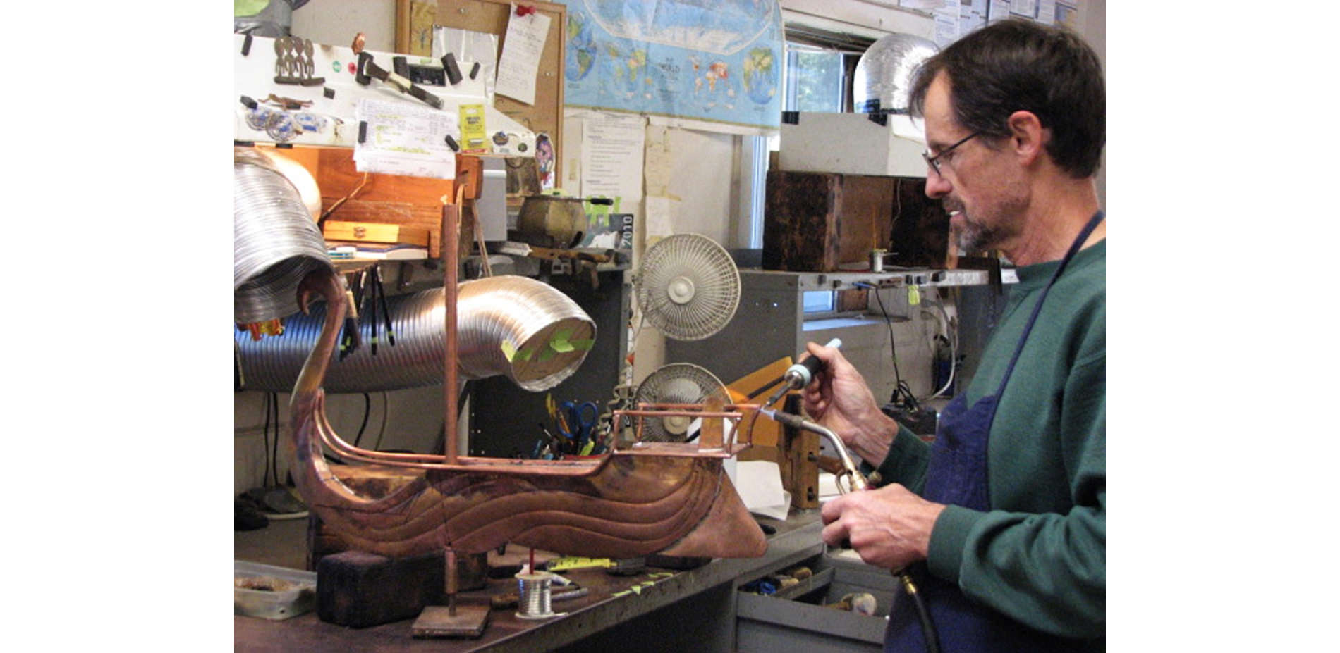 Artisan Working on Sculpture