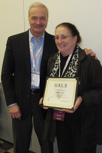 Third place winner Marion Pressley accepting the award from Paul Dolinsky, Chief of HALS. image: Chris Stevens